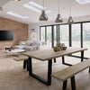Stylish dining room featuring a statement Solid oak dining tables setup with coordinated interior décor and modern seating.