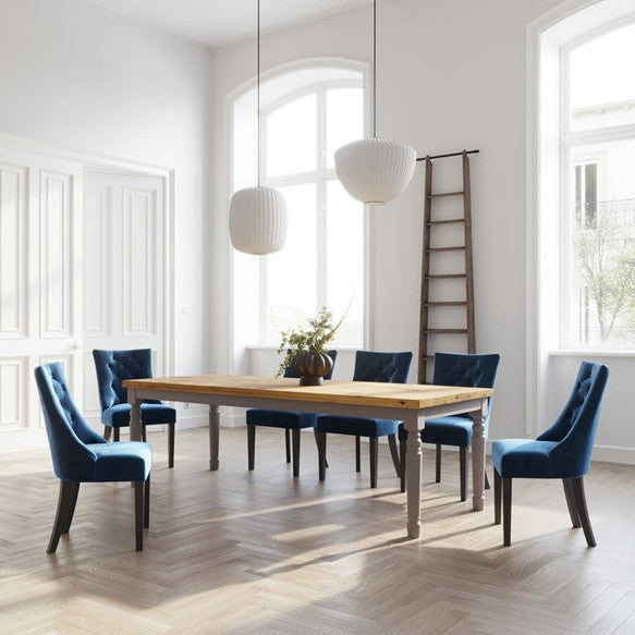 Solid wood Rustic Farmhouse Dining Table in a warm farmhouse interior showcasing natural oak grain and traditional craftsmanship.